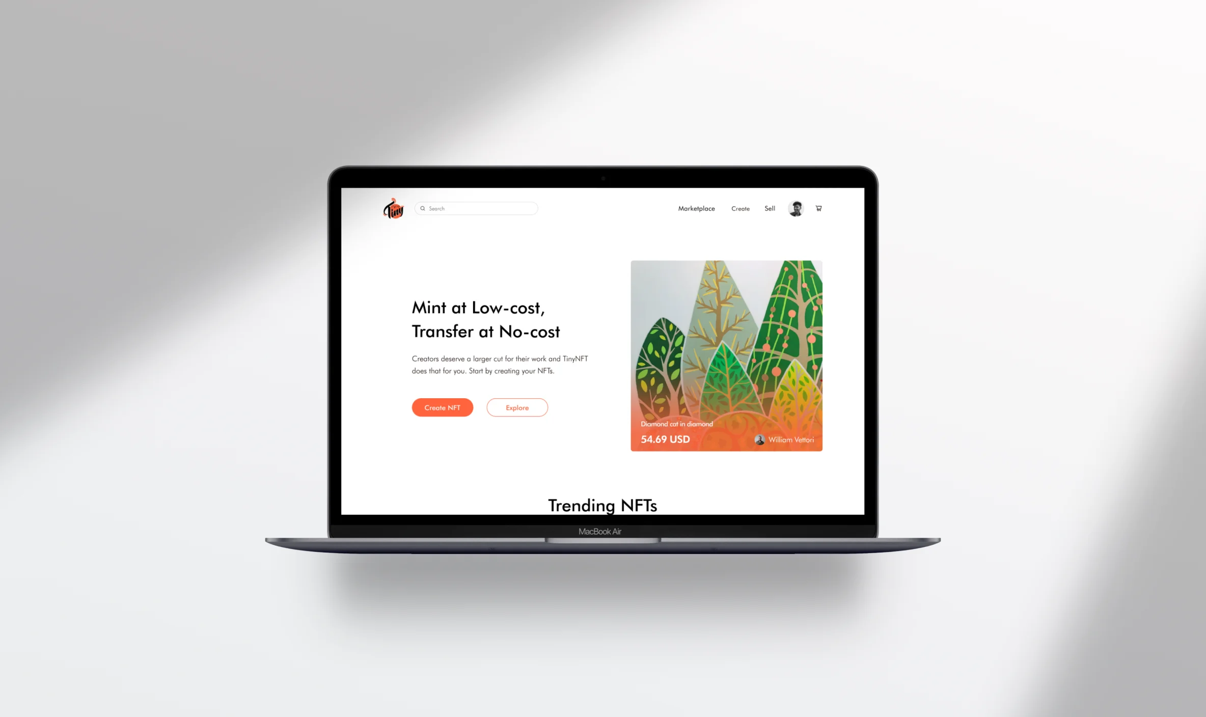 TinyNFT landing page on a laptop mockup.